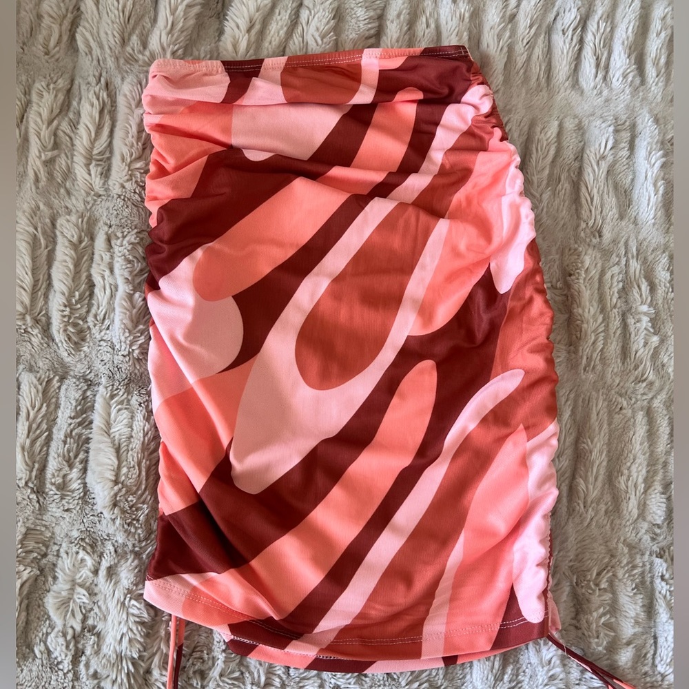 Never worn princess Polly mini skirt with ties